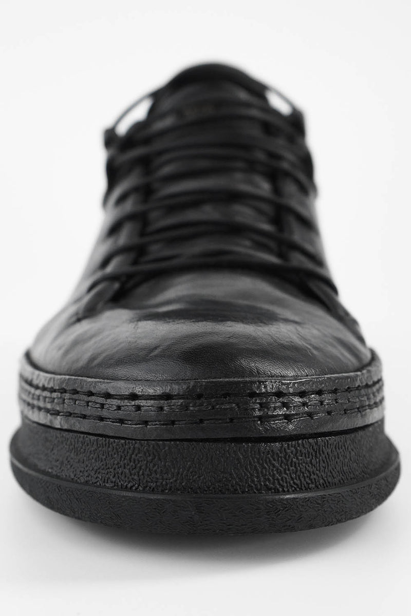 COLE rugged-black welted distressed sneakers.