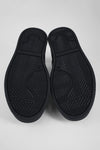 CREED jet-black distressed sneakers.