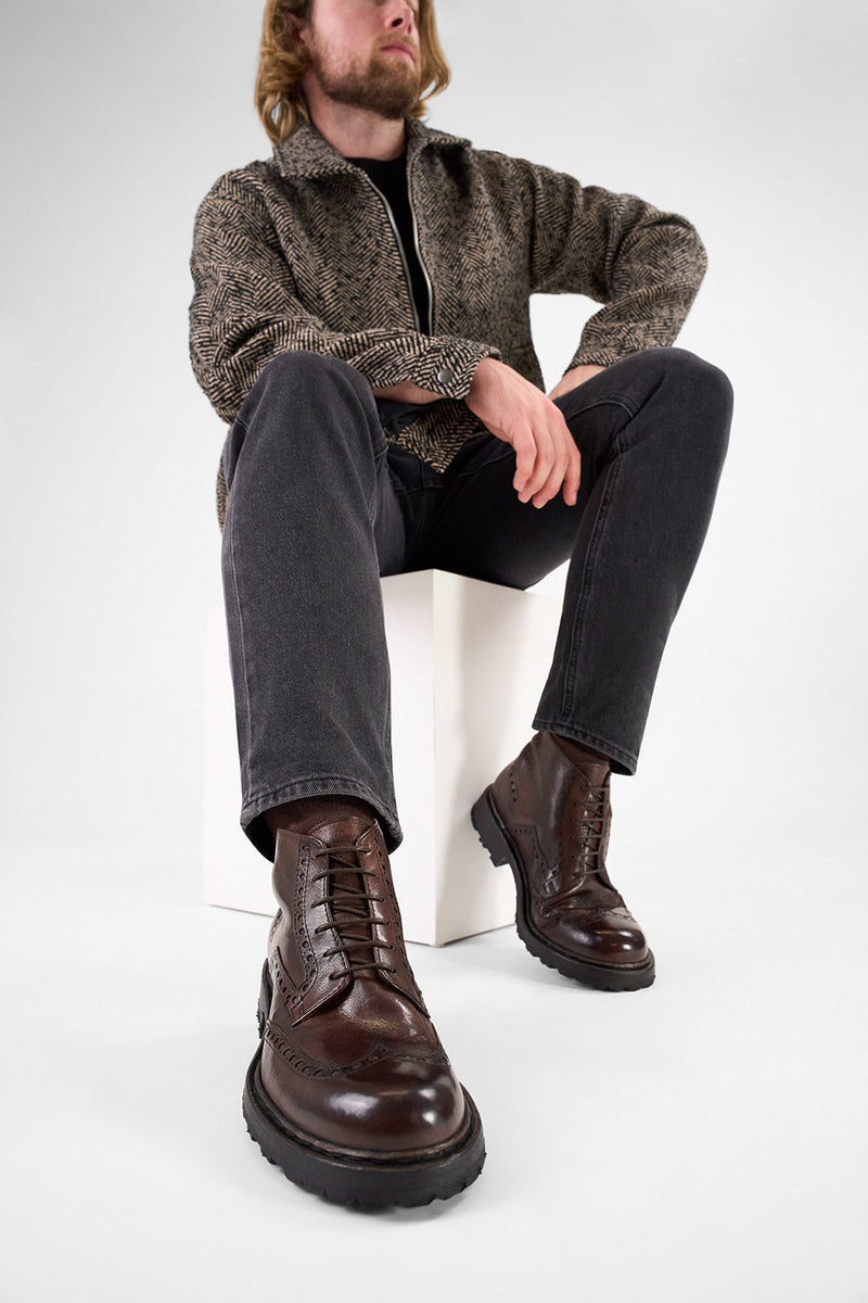 DRAKE dark-chestnut brogue chukka boots.