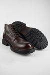 DRAKE dark-chestnut brogue chukka boots.