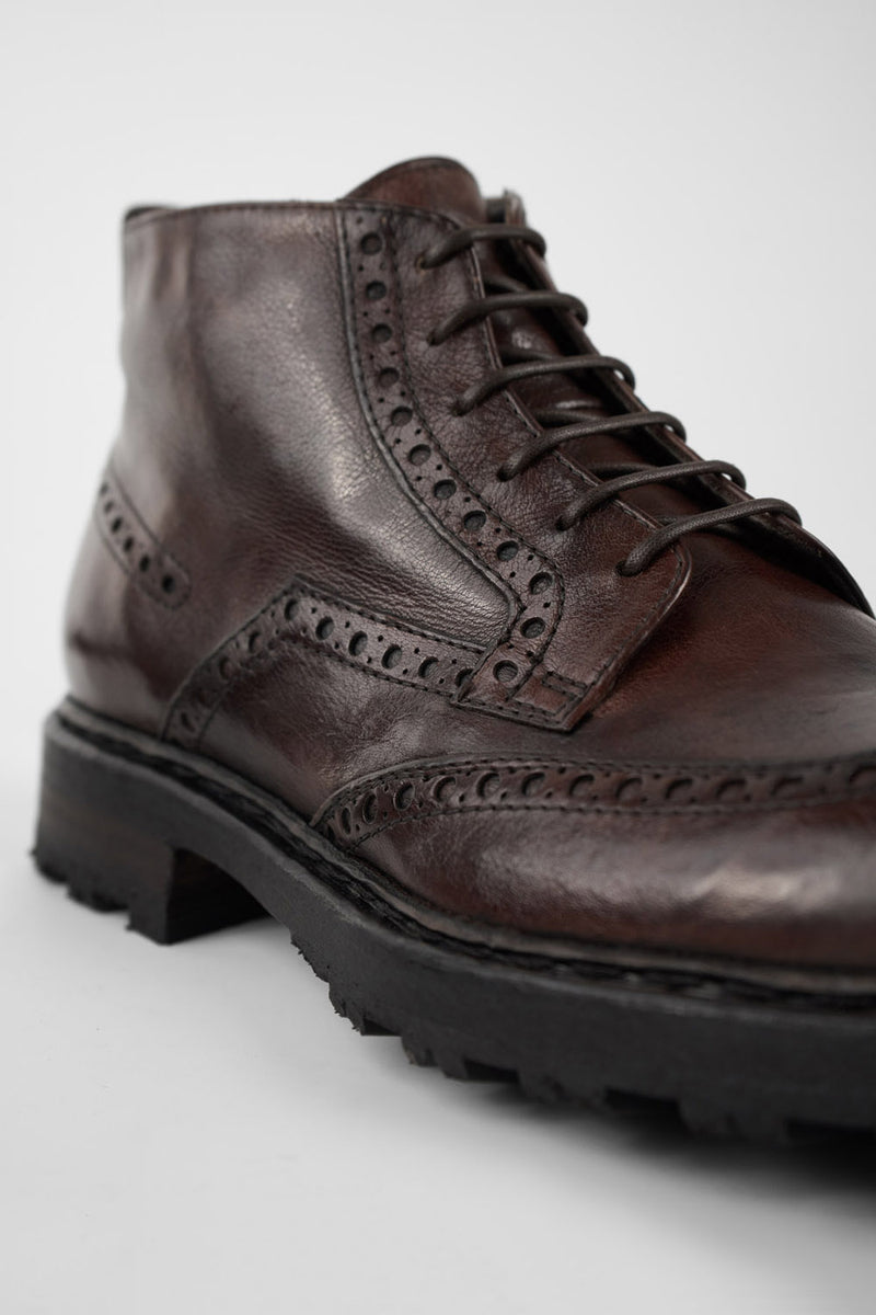 DRAKE dark-chestnut brogue chukka boots.
