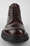 DRAKE dark-chestnut brogue chukka boots.