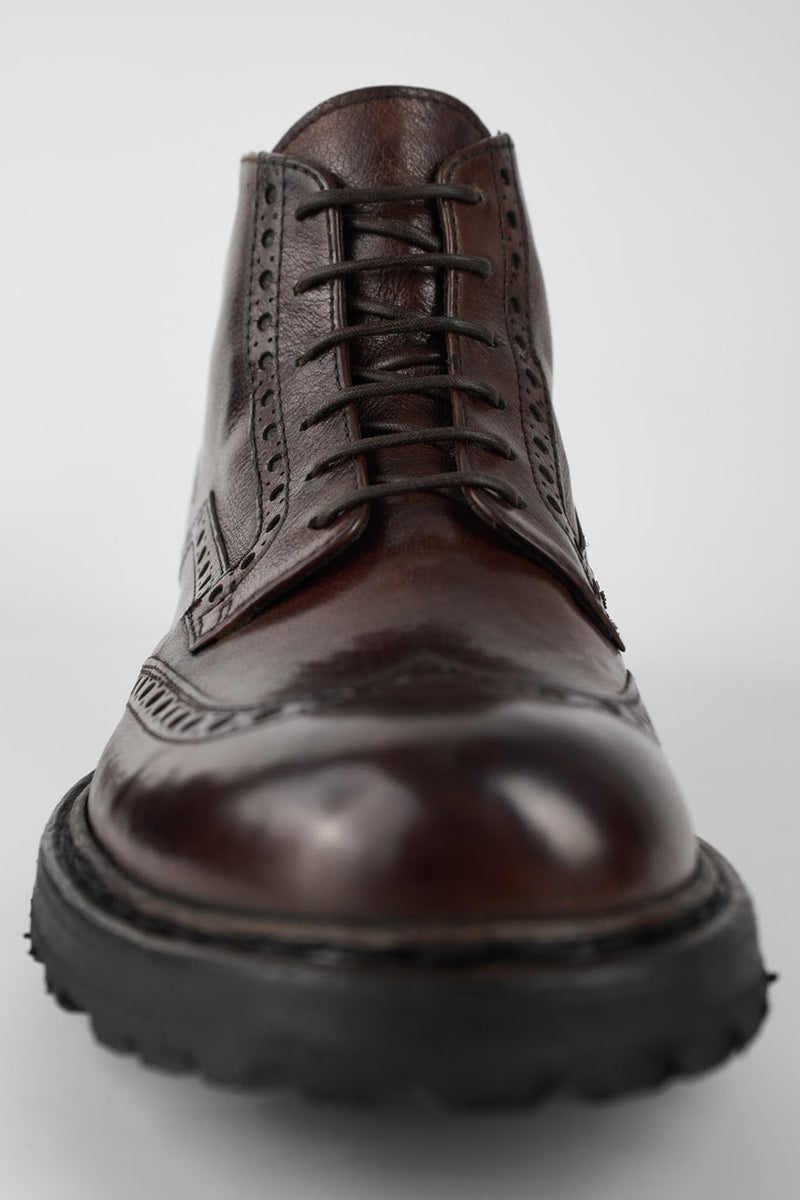 DRAKE dark-chestnut brogue chukka boots.