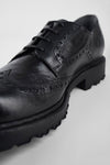 DRAKE jet-black brogue derby shoes.