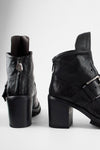 EDEN jade-black buckle boots.