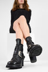 EDEN jade-black buckle boots.