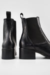 EXETER jet-black chelsea boots.