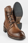 EXETER caramel-brown lace-up boots.