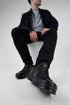 HAYES black distressed welted sneakers.
