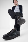HAYES black distressed welted sneakers.