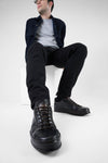 HAYES black distressed welted sneakers.