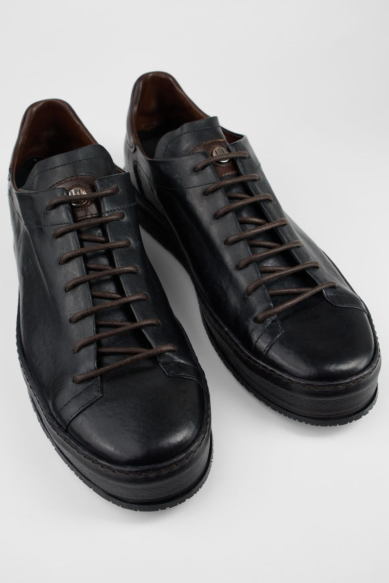 HAYES black distressed welted sneakers.