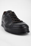 HAYES black distressed welted sneakers.