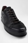 HAYES black distressed welted sneakers.