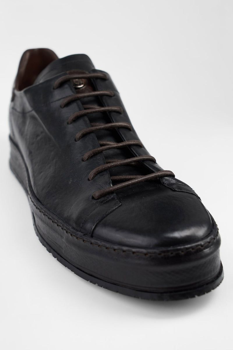 HAYES black distressed welted sneakers.