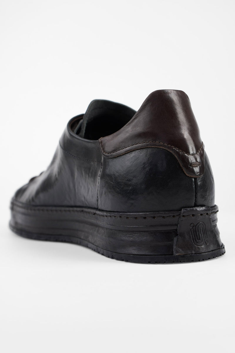 HAYES black distressed welted sneakers.