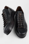 HAYES black distressed welted sneakers.