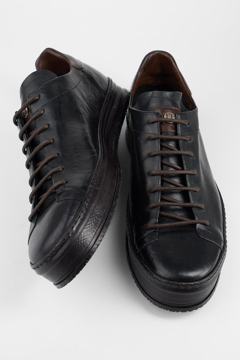 HAYES black distressed welted sneakers.