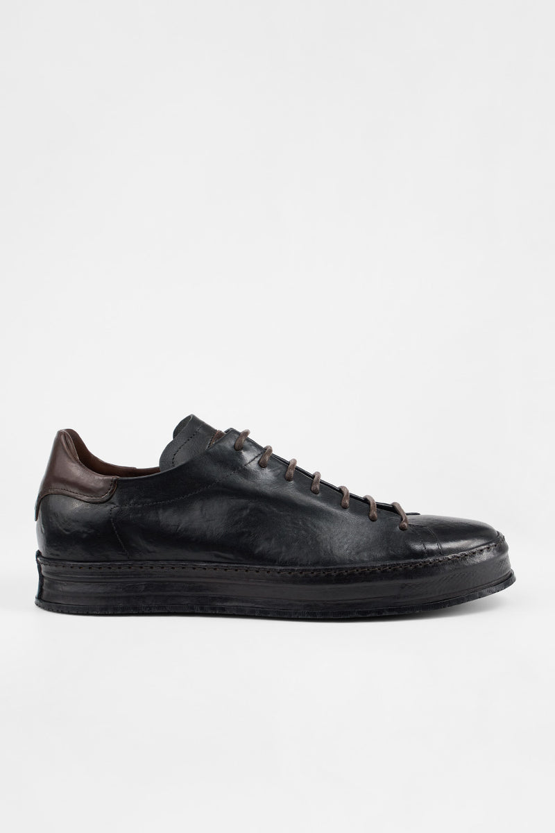 HAYES black distressed welted sneakers.