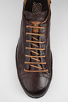 HAYES dark-cocoa distressed welted sneakers.