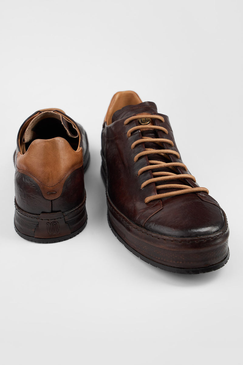 HAYES dark-cocoa distressed welted sneakers.