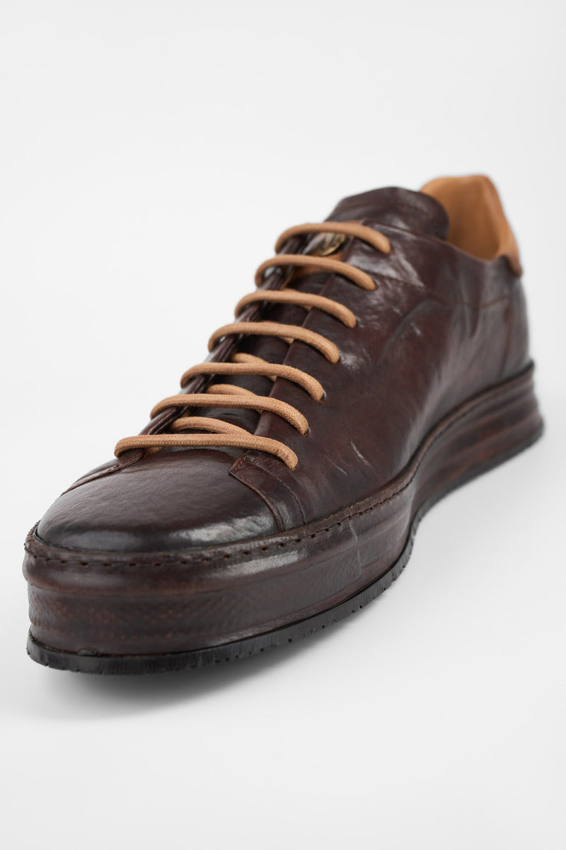 HAYES dark-cocoa distressed welted sneakers.