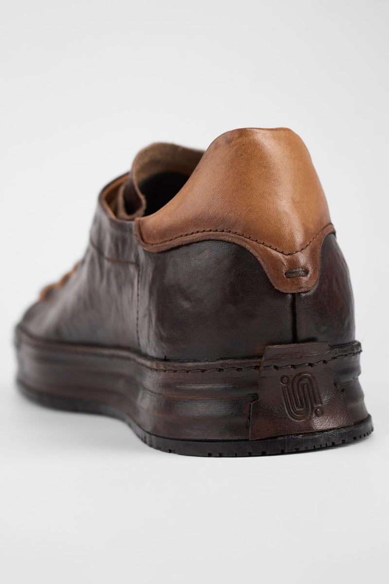 HAYES dark-cocoa distressed welted sneakers.