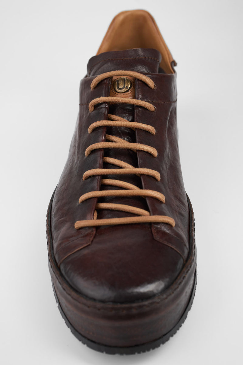 HAYES dark-cocoa distressed welted sneakers.
