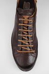 HAYES dark-cocoa distressed welted sneakers.