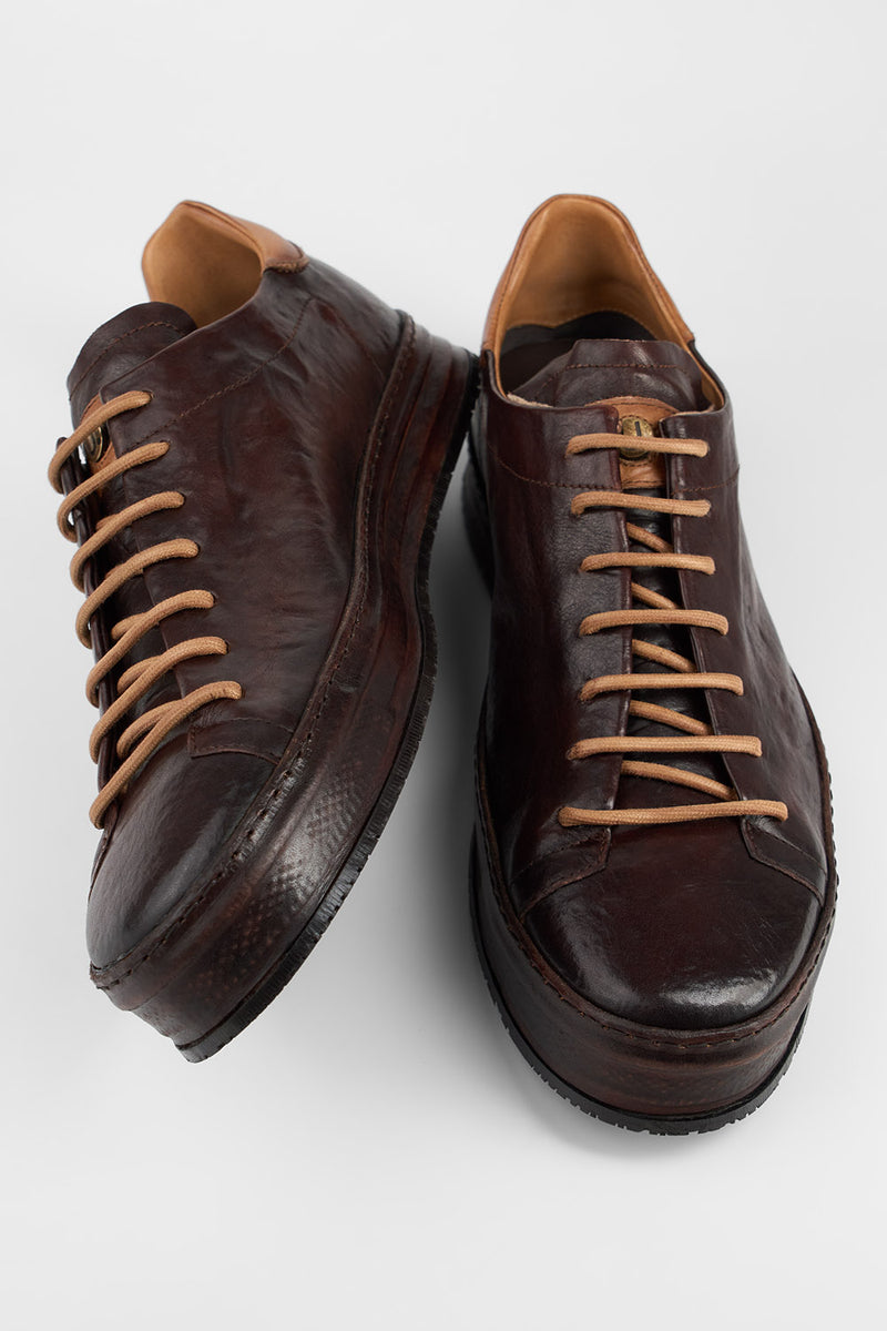 HAYES dark-cocoa distressed welted sneakers.
