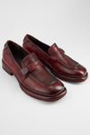 IVES ruby-red slip on shoes.