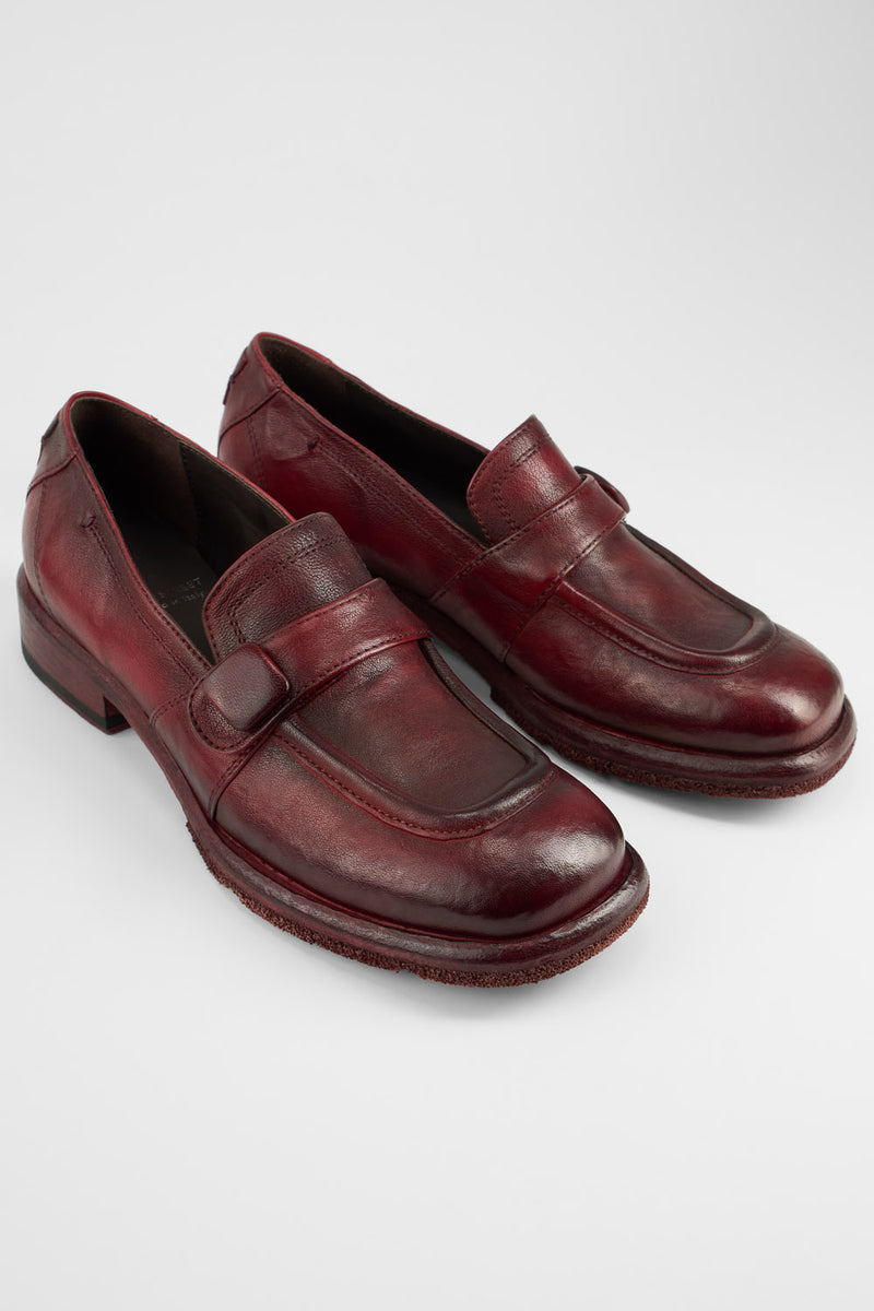 IVES ruby-red slip on shoes.