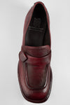 IVES ruby-red slip on shoes.