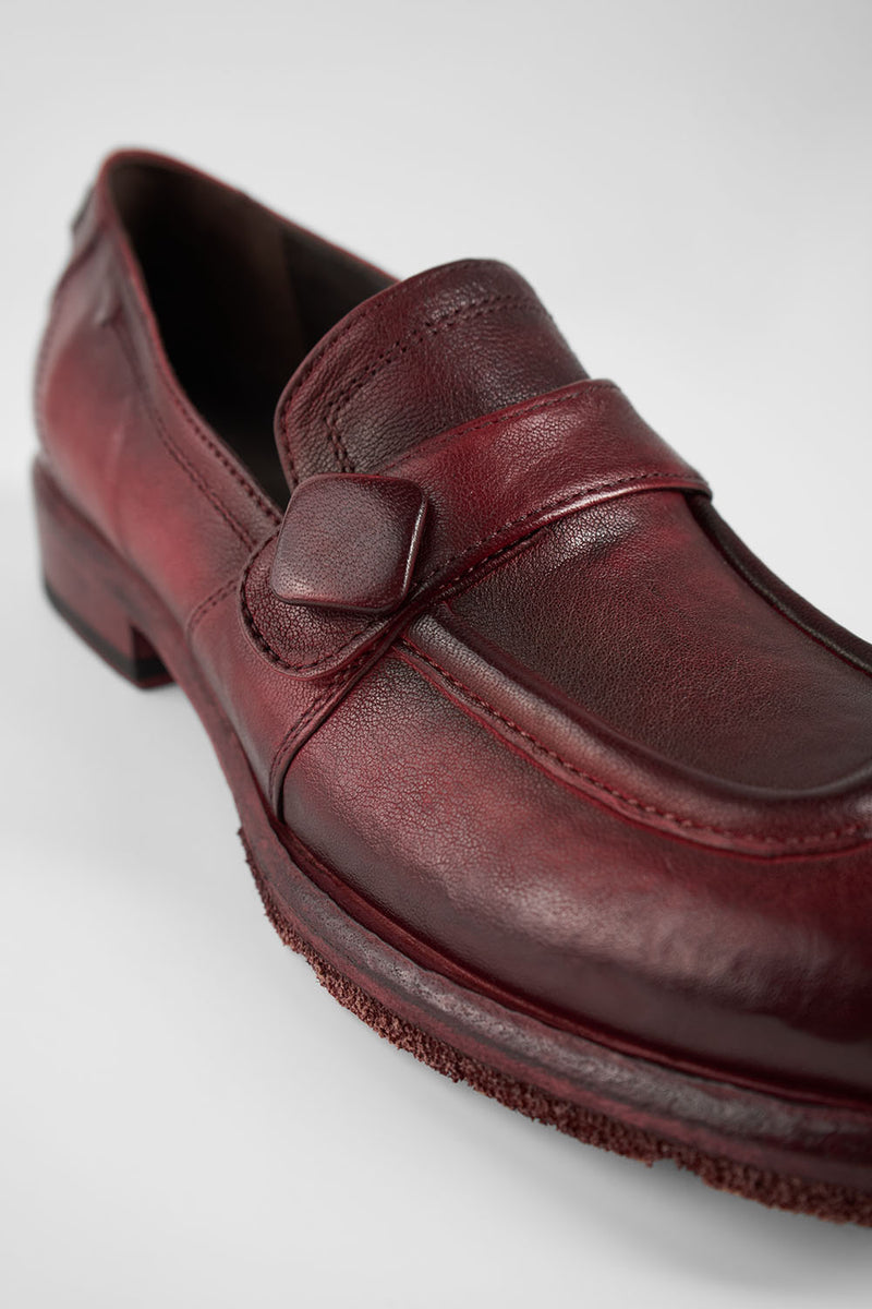 IVES ruby-red slip on shoes.
