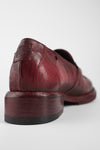 IVES ruby-red slip on shoes.