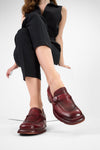 IVES ruby-red slip on shoes.