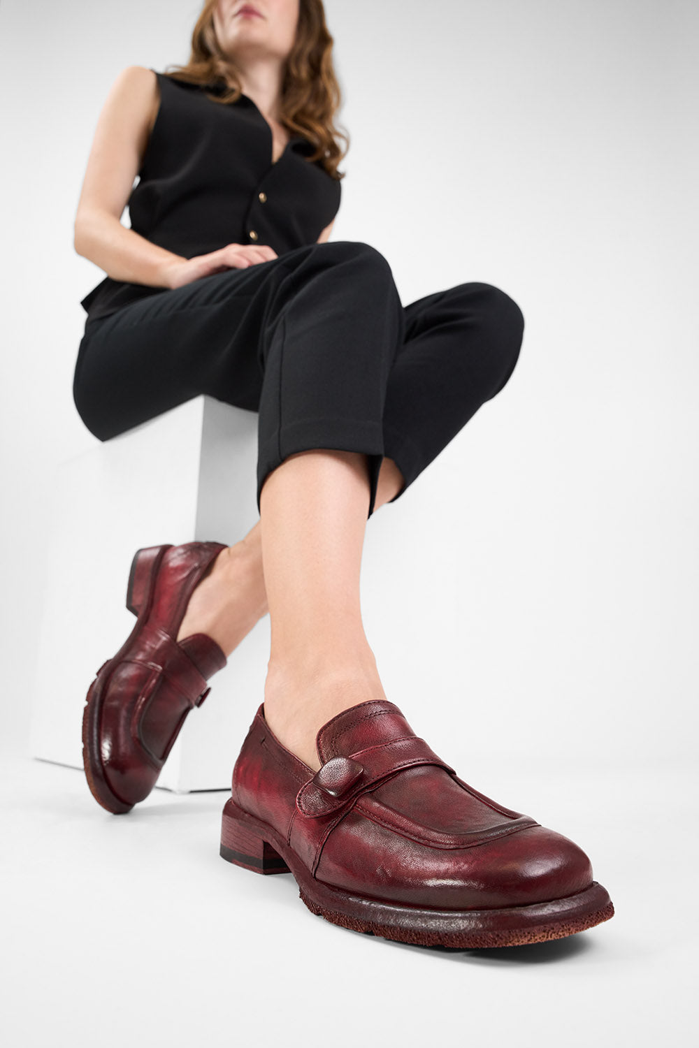 IVES ruby-red slip on shoes.