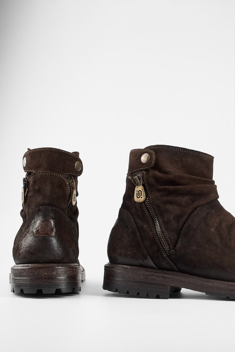KEATS burnt-umber suede laceless boots.