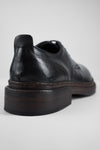 LAMBETH jet-black welted derby shoes.