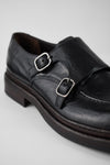 LAMBETH jet-black welted monk shoes.