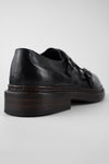 LAMBETH jet-black welted monk shoes.