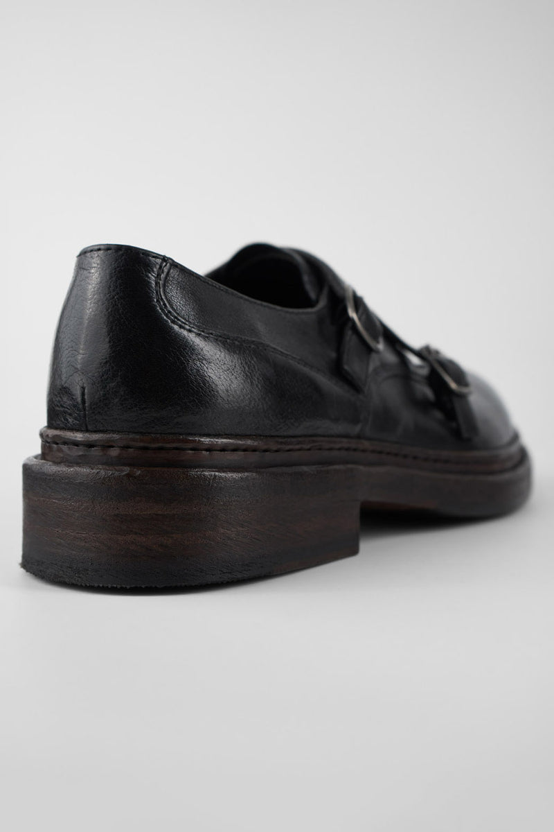 LAMBETH jet-black welted monk shoes.