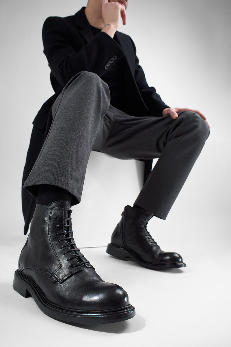 BOLTON limo-black layered lace up boots.