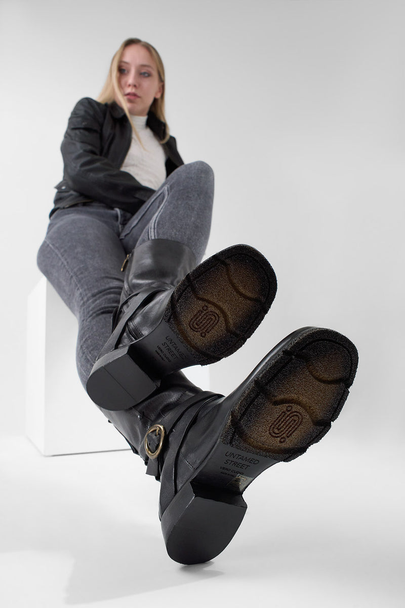 IVES urban-black tall buckle boots.