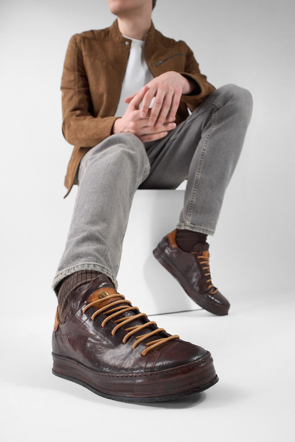 HAYES dark-cocoa distressed welted sneakers.