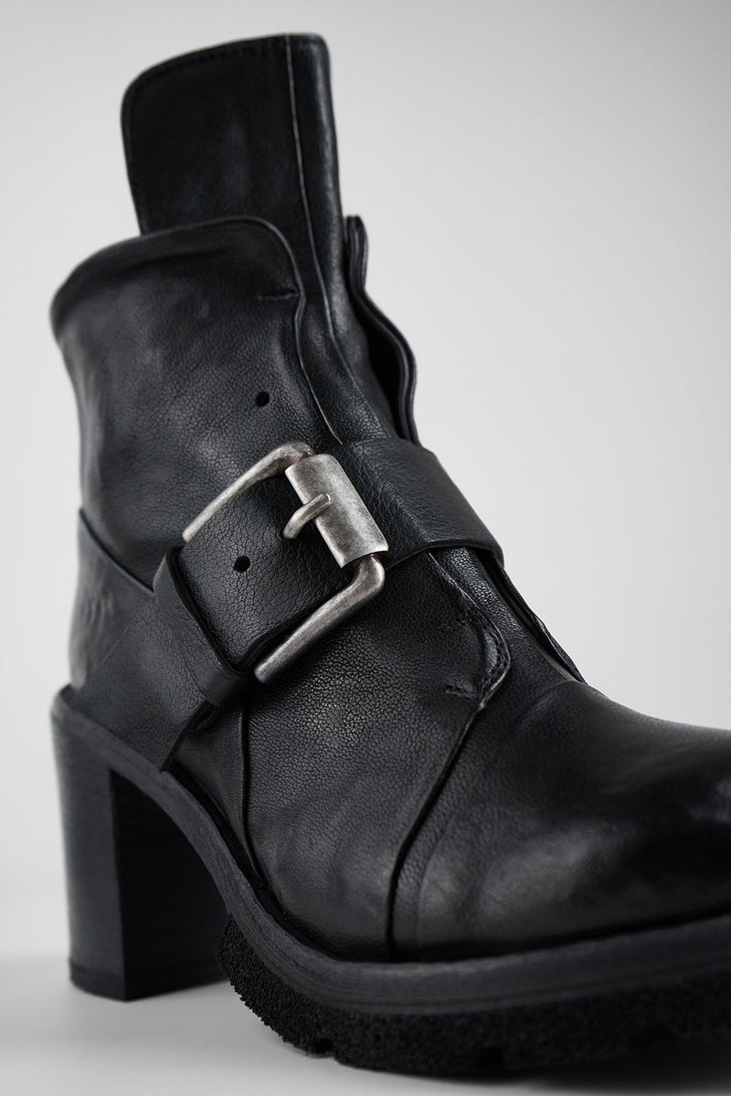 EDEN jade-black buckle boots.