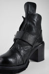 EDEN jade-black buckle boots.