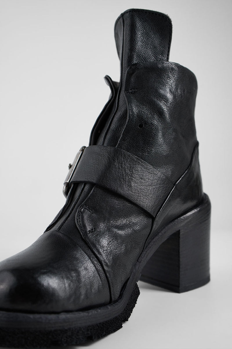 EDEN jade-black buckle boots.