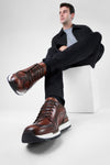 OWEN cocoa-brown triple stitched wingtip patina runners.
