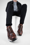 OWEN cocoa-brown triple stitched wingtip patina runners.